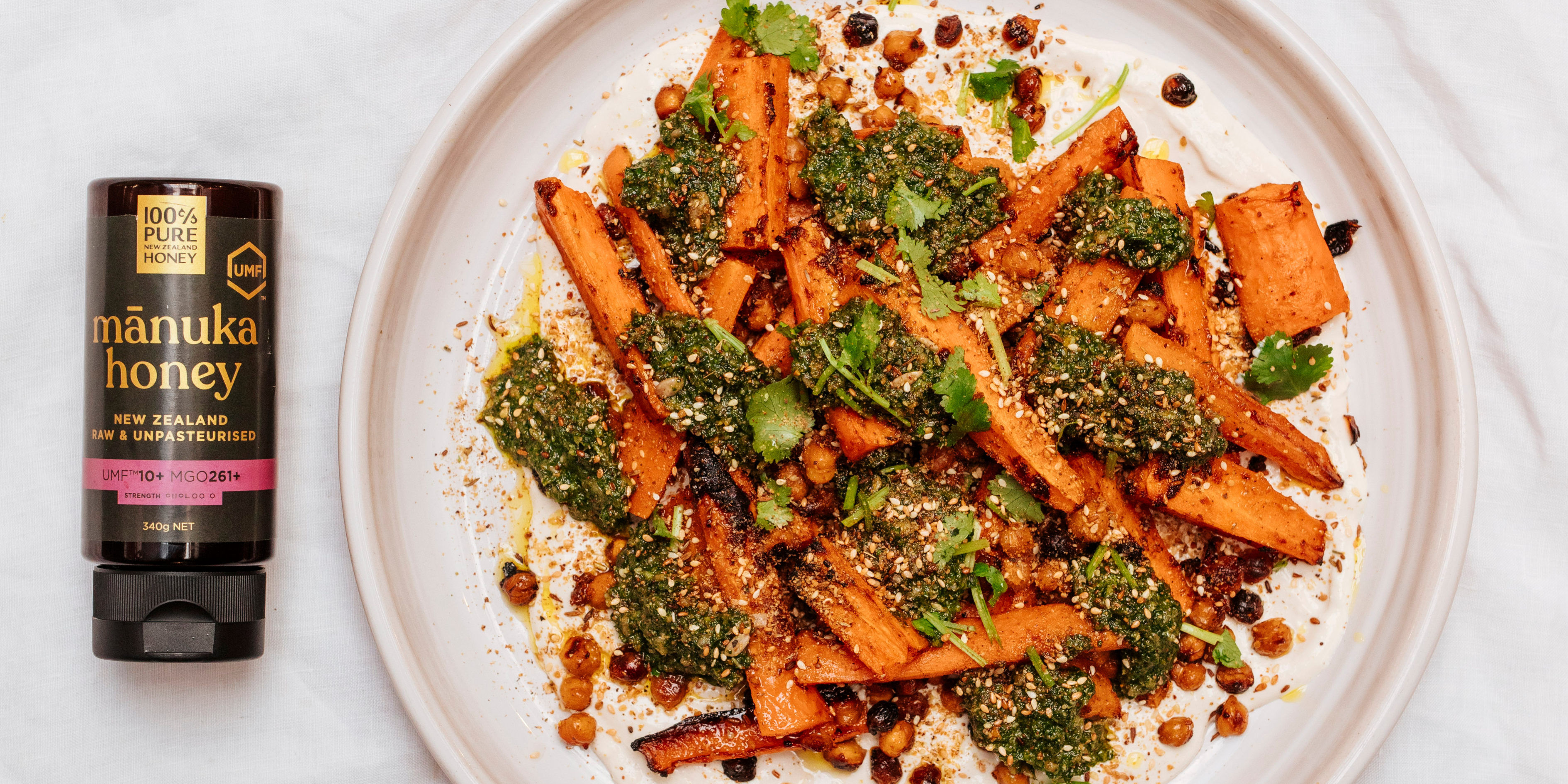 Mānuka Honey Harissa Carrots with Crispy Chickpeas, Whipped Feta & Herb Oil