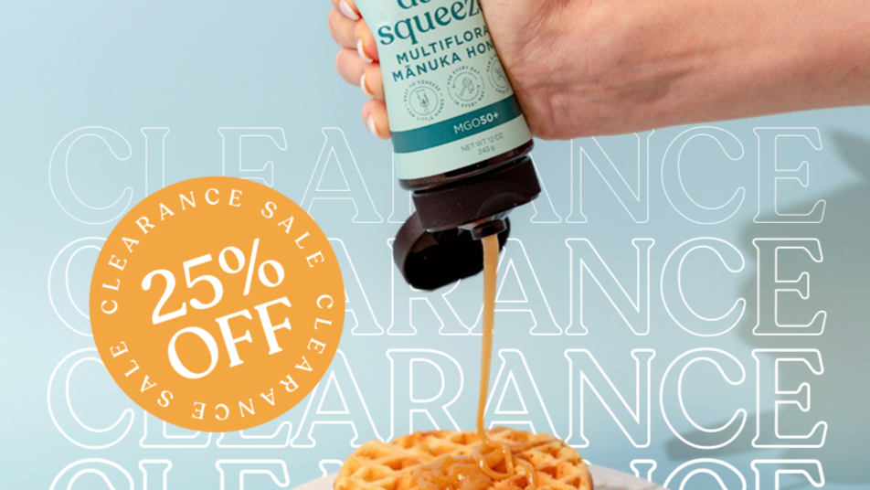 Hand pouring honey from a bottle onto waffles with a 'Clearance Sale' text overlay.
